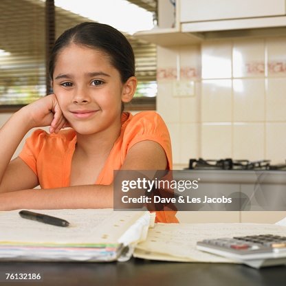 Burmese girl doing home work Burmese girl doing home work