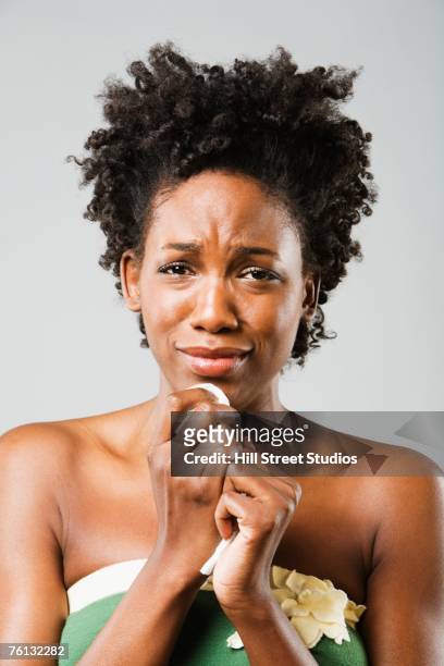 african american woman crying - crying woman stock-fotos und bilder
