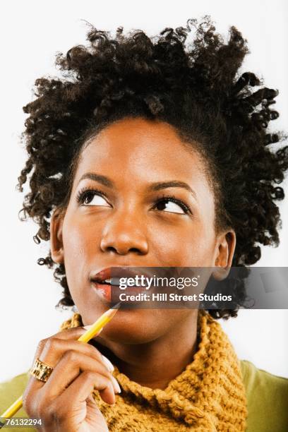 african american woman thinking - asking face stock pictures, royalty-free photos & images