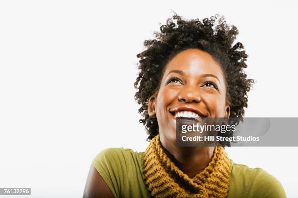 african american woman looking up - hill street studios bildbanksfoton och bilder