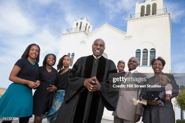 african american reverend and parishioners in front of church - black people in church stock pictures, royalty-free photos & images