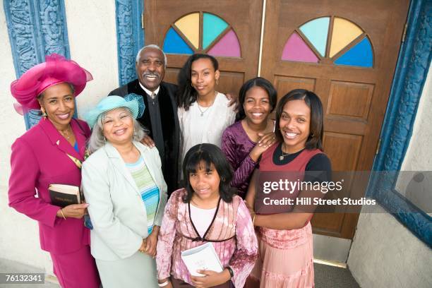 african american reverend and parishioners in front of church - black women in the bible stock pictures, royalty-free photos & images