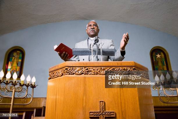 african american reverend preaching in church - pulpet bildbanksfoton och bilder