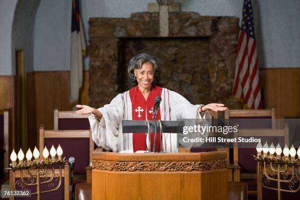 african american female reverend preaching in church - 説教師 ストックフォトと画像