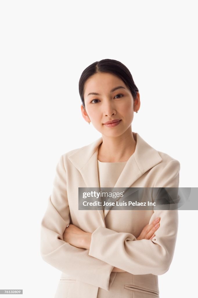 Asian businesswoman with arms crossed