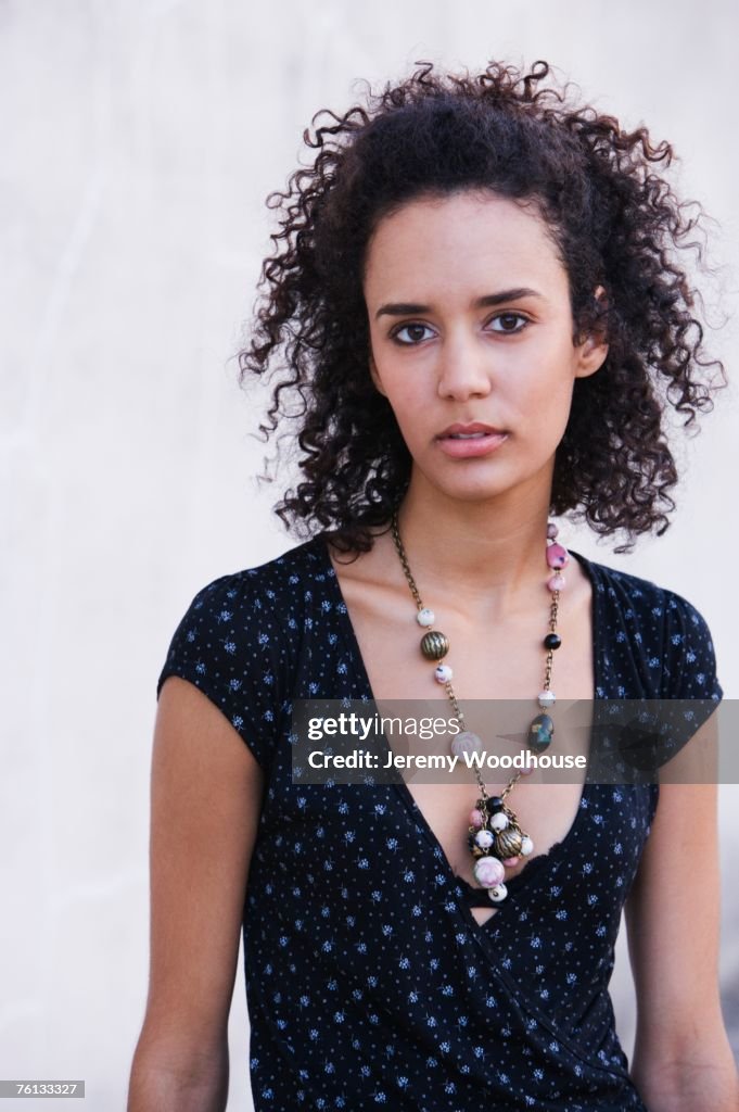 Mixed Race woman wearing necklace