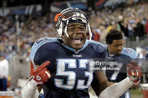 Titans linebacker Keith Bullock celebrates on the sideline after Tennessee defeated the New York Giants at LP Field on a last-minute 49-yard field...