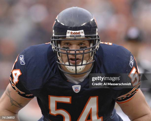 Chicago Bears linebacker Brian Urlacher line up on defense against the Tampa Bay Buccaneers on December 17, 2006 at Soldier Field in Chicago,...