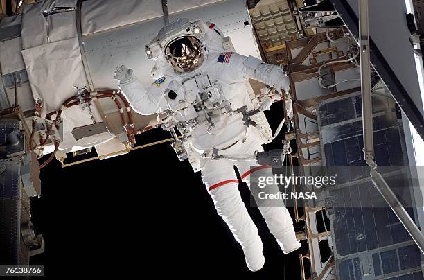 In this handout photo provided by NASA, Astronaut Rick Mastracchio, STS-118 mission specialist, participates in the mission's first planned session...