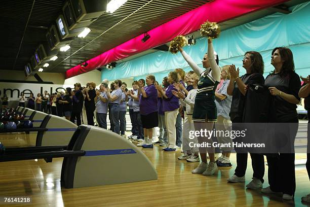 Teams participate in the first day of the United States Bowling Congress Women's Championships Thursday, April 12 at Northcross Lanes in...