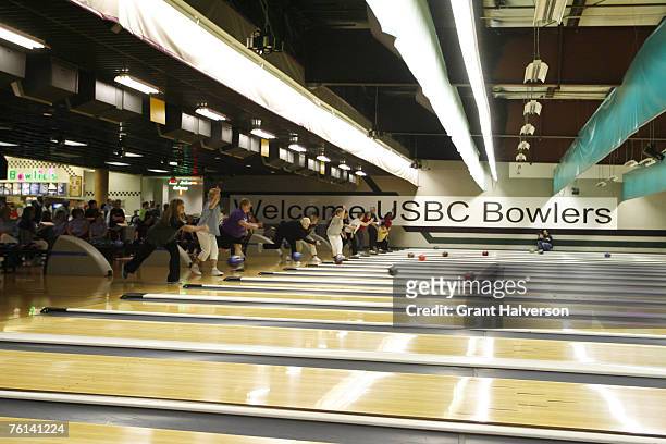Teams participate in the first day of the United States Bowling Congress Women's Championships Thursday, April 12 at Northcross Lanes in...
