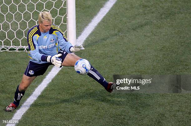 Goalkeeper Kevin Hartman of the Kansas City Wizards makes a save against the New York Red Bulls in the first half at Giants Stadium in the...