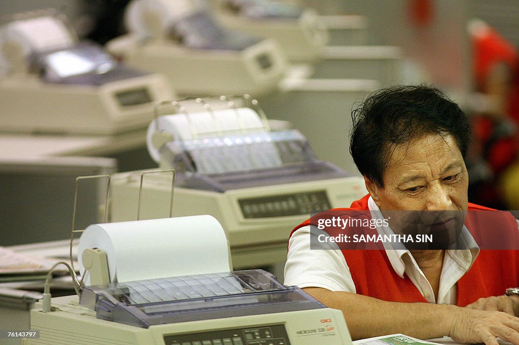 A trader at the Hong Kong Stock Exchange