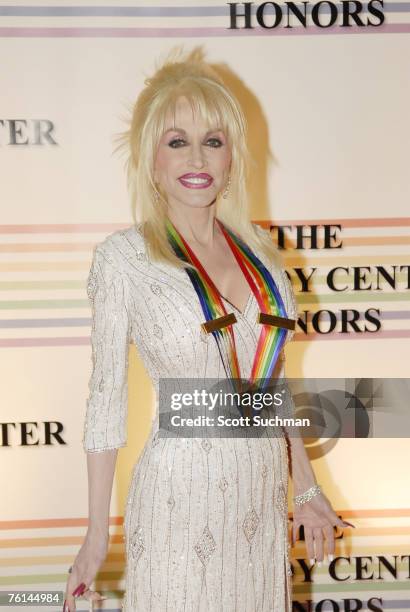 Honoree Dolly Parton, in a dress by Robert Bahar, arrives at the 2006 Kennedy Center Honors Sunday night in Washington DC. The 29th Annual Kennedy...