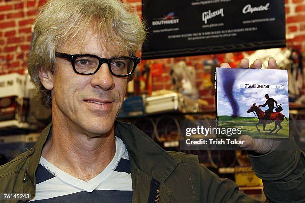 The Police drummer Stewart Copeland signs autographs at the Guitar Center to promote his new solo release "The Stewart Copeland Anthology" on August...