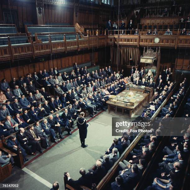 The British State Opening of Parliament ceremony commencing in the House of Commons with Black Rod's summons to the members to come to the other...