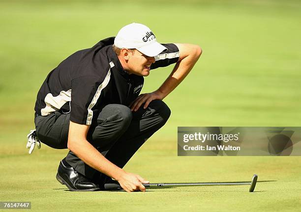 Edward Rush of England lines up a put on the 18th hole during the 2nd round of the Scandinavian Masters 2007 at the Arlandastad Golf Club on August...