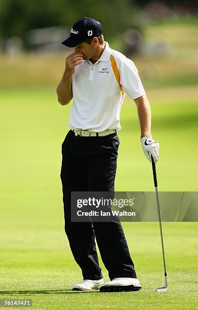 Scott Strange of Australia reacts to a shot on the 9th hole during the 2nd round of the Scandinavian Masters 2007 at the Arlandastad Golf Club on...
