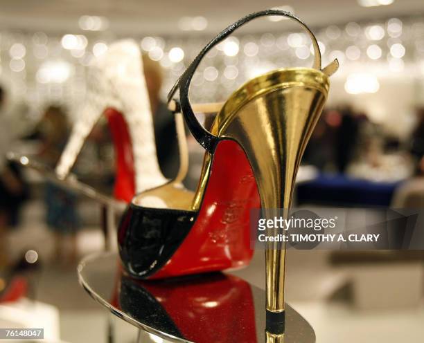 Christian Louboutin heels are seen on display as Saks Fifth Avenue unveils 17 August 2007 "10022-SHOE", the new designer shoe floor that's so big it...