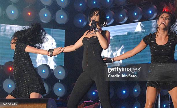 Singer Rihanna performs on stage at the Tokyo leg of the Live Earth series of concerts, at Makuhari Messe, Chiba on July 7, 2007 in Tokyo, Japan.