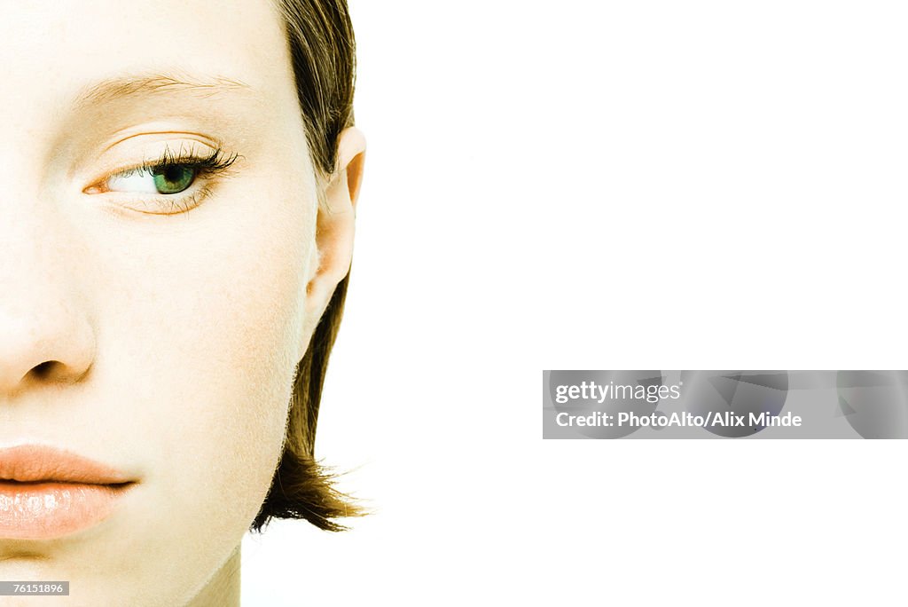 "Teenage girl's face, extreme close-up"