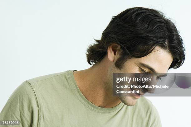 "man, head down, portrait" - man looking down side view stock pictures, royalty-free photos & images
