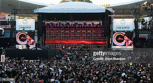 Fans attend the Australian leg of the Live Earth series of concerts, at Aussie Stadium, Moore Park on July 7, 2007 in Sydney, Australia. Launched by...
