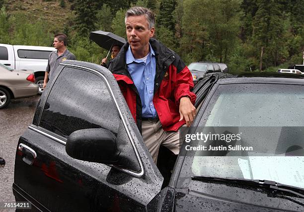 Utah governor Jon Huntsman gets into his car after speaking to reporters about the recent collapse at the Crandall Canyon coal mine August 17, 2007...