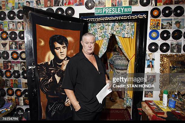 Elvis Presley fan Paul MacLeod gives a tour of his vast collection of Presley related items, 17 August 2007, at his home which he calls "Graceland...