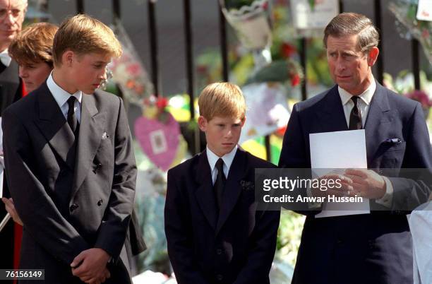 The Prince of Wales with Prince William and Prince Harry outside Westminster Abbey at the funeral of Diana, The Princess of Wales on September 6,...