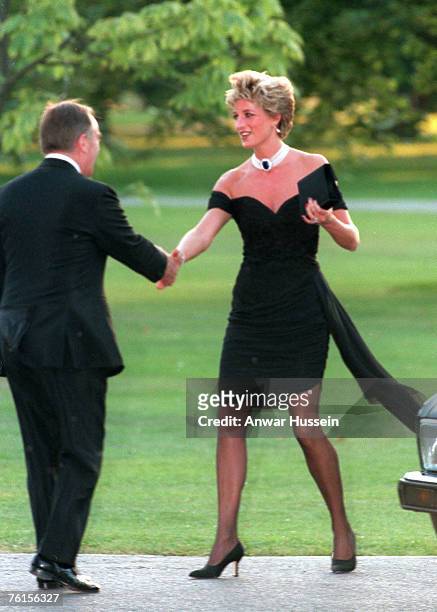 Diana, Princess of Wales, wearing a stunning black dress commissioned from Christina Stambolian, attends the Vanity Fair party at the Serpentine...