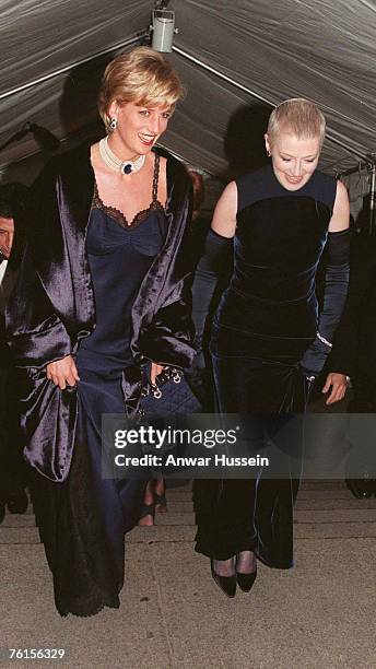 Diana, Princess of Wales, wearing a John Galliano dress, arrives with her friend Liz Tilberis for a Costume Institute Ball at the Metropolitan Museum...