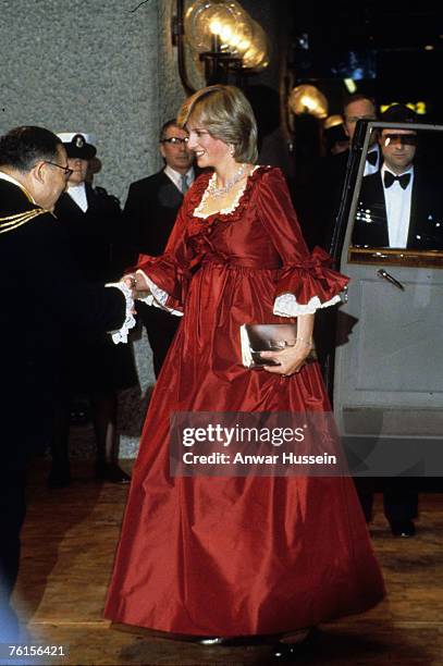 Diana wears David Sassoon red maternity dress at Barbican Centre in March 1982.