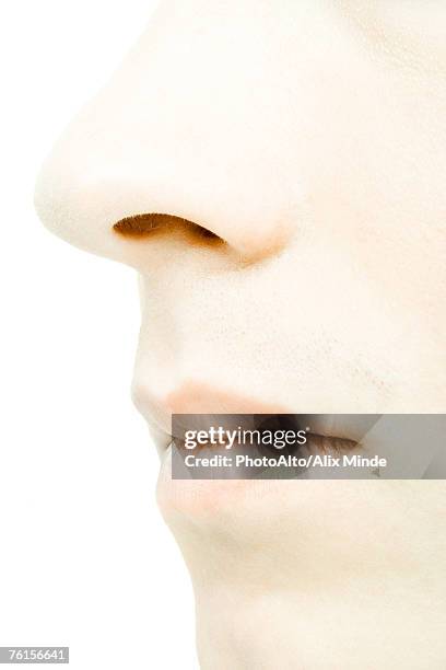 "young man's face, extreme close-up" - nariz humano imagens e fotografias de stock