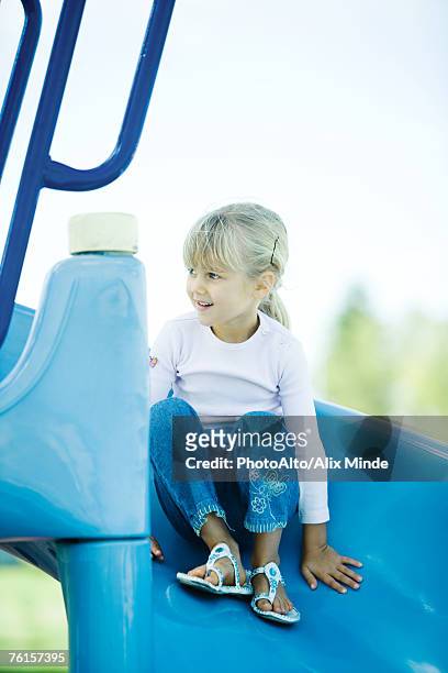 child on playground equipment - northern european descent ストックフォトと画像