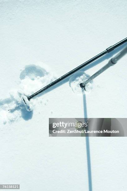 ski sticks in snow, close-up - ski pole stock pictures, royalty-free photos & images
