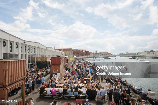 crowd by river - copenhagen food stock pictures, royalty-free photos & images