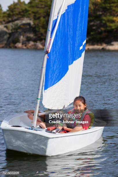 girl in sailing boat. - kid sailing imagens e fotografias de stock