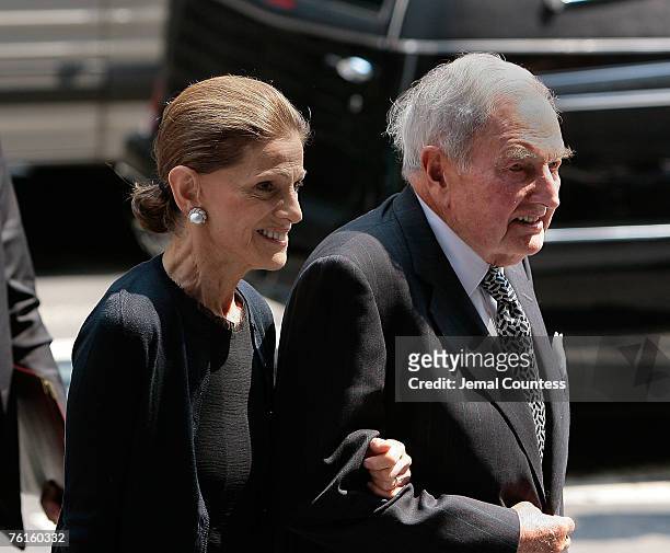Annette De La Renta and Financier David Rockefeller arrive at the memorial service for Philanthropist Brooke Astor at St. Thomas Church on Fifth...