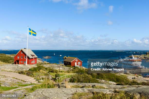 view of rocky coast - schweden stock-fotos und bilder