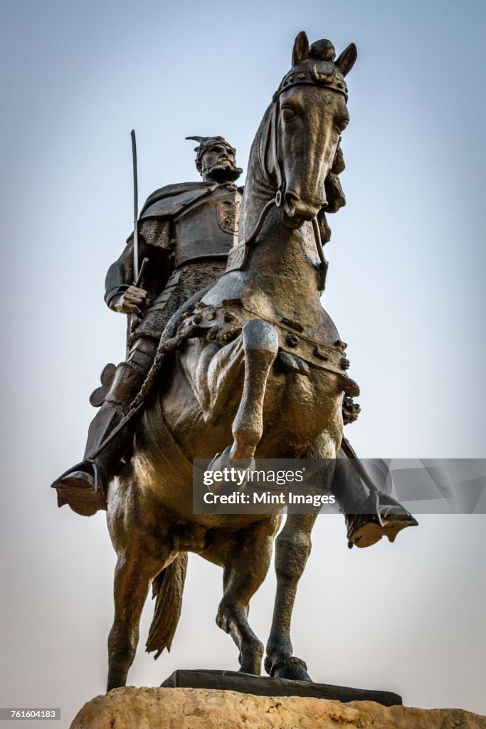 Low angle view of statue of Gjergj Kastrioti, known as Skanderberg on horseback on the main square in Tirana, Albania.