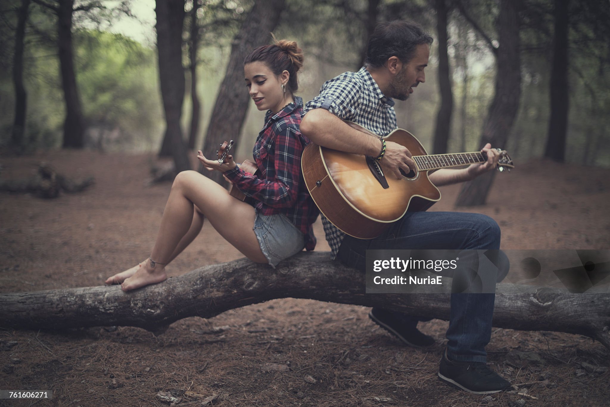 https://media.gettyimages.com/id/761606271/photo/man-and-girl-sitting-in-forest-playing-the-guitar-and-ukulele-spain.jpg?s=2048x2048&amp;w=gi&amp;k=20&amp;c=vyySjiP8_jY0w14sg1_vfv8aS6SvY9KDXt_677Yugpo=