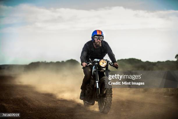 Man Riding Raser Bike 540 Cafe Racer Bike Stock Photos, High-Res Pictures, and Images - Getty ...