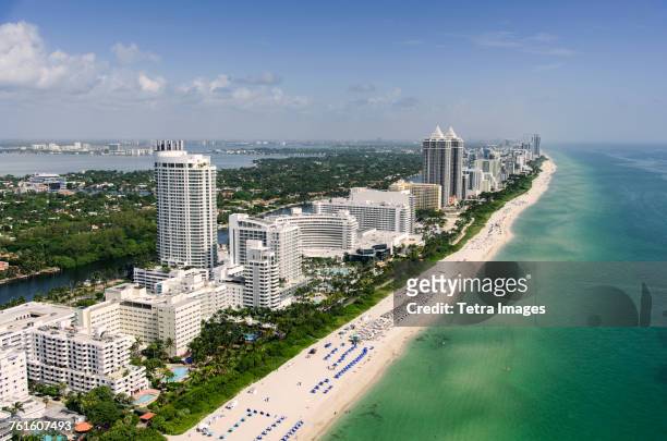 usa, florida, miami, aerial view of coastal city - florida coastline stock pictures, royalty-free photos & images