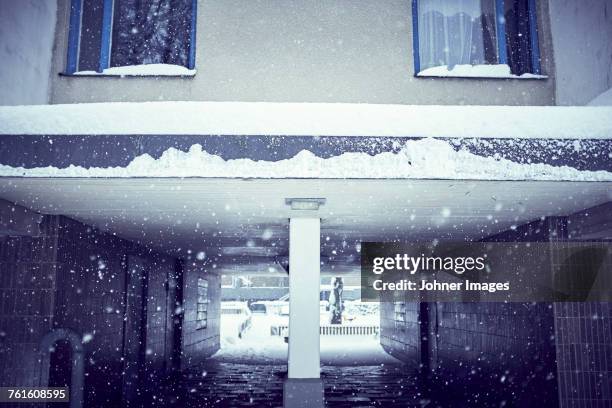 tunnel under block of flats - stockholm winter stock pictures, royalty-free photos & images