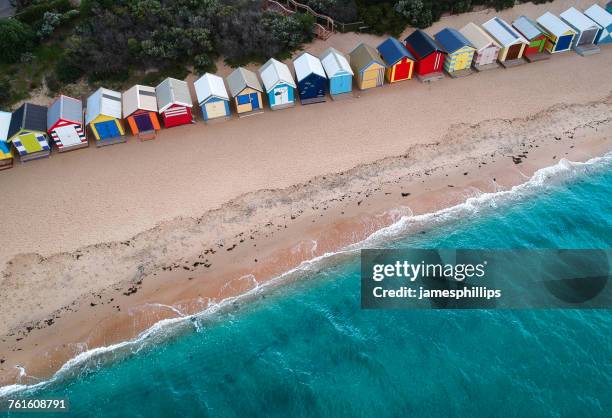 aerial view of beach huts on brighton beach, melbourne, victoria, australia - strandhütte stock-fotos und bilder