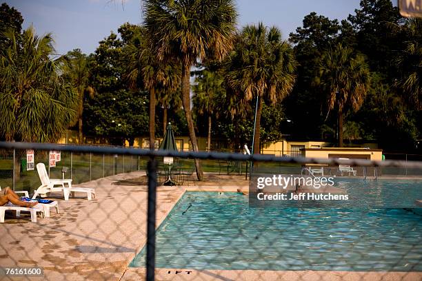 Motel guest cool off in the pool on a hot summer's day at South of the Border on July 21, 2006 in Dillon, South Carolina. Nearly unrivaled as a...