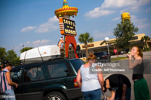 The Thogode family loads the car up and gets ready to hit the road after a brief stop over at South of the Border during a New York - Florida trip at...