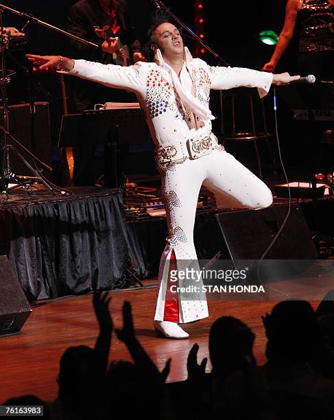 Shawn Klush of Franklin, Tennessee finishes his performance just before being declared winner in The Ultimate Elvis Tribute Artist Contest 17 August...