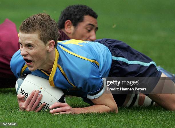 Carl Perry of Mount Albert Grammar scores a try during the Auckland Schoolboy Final match between De La Salle College and Mount Albert Grammar School...